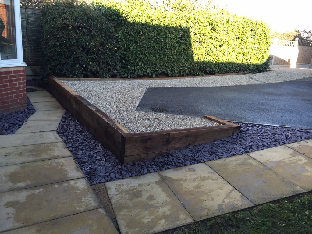 Completed job, landscaping and driveway with retained railway sleeper edging