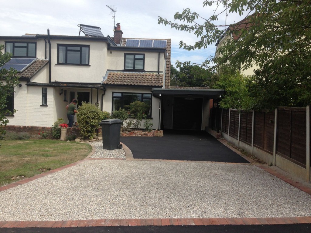 Completed Job - Hot rolled tarmac at rear with hot bitumin embeded with pea shingle at front